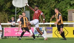Walsall striker Jamille Matt controls the ball.