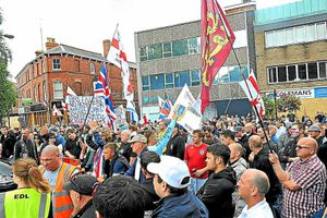 English Defence League members gather in Church Street, Wellington, during a rally in August 2011