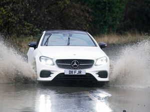 Supporting image for story: How should I drive if I get caught in a thunderstorm?