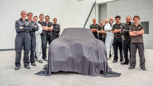 CMC's team preparing to unveil the restored car
