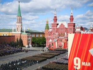 Military troops stand in formation in Red Square