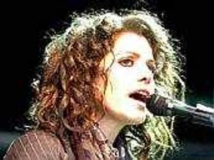 Supporting image for story: Soulful star Katie warms up crowd