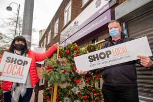 Wendy Durber, owner of Orchard Florists in Church Street, Bilston, with Simon Archer, Bilston BID Manager