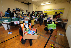 Church minister David Abraham, with volunteers