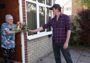 Richard Marchant presents flowers to Cath Donovan
