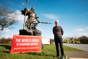 Chairman Clive Knowles with the Guan Yu sculpture