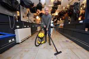 Jonathan Ruddock inside the Lighthouse shop where he wrapped up the display lights to protect them