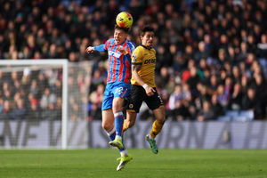 Jorgen Strand Larsen going up against Hugo Bueno at Selhurst Park in February after the striker completed a £43million switch to Crystal Palace. (Photo by Luke Hales/Getty Images)