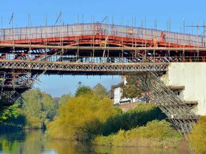 Supporting image for story: Iron Bridge covers red-y to come off