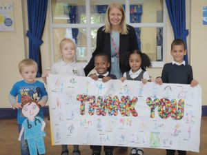 Supporting image for story: Artwork and thank you banner given to nurses by schoolchildren to mark International Nurses’ Day