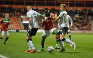 Walsall's Emmanuel Osadebe and Oldham's Hallam Hope.