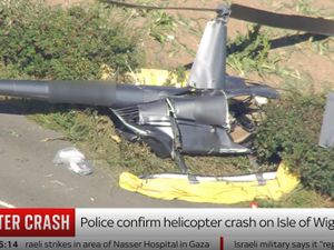 Supporting image for story: Helicopter operators defend pilot over Isle of Wight crash that killed three