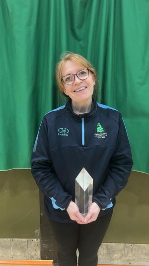 Briony with the Ian Martin Award for Disability Inclusion in Cricket 