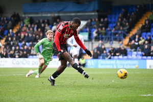 Daniel Kanu rolls in his 14th goal of the season to make it 2-0 to Walsall.