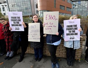 Hospital workers hold a protest outside Walsall Manor Hospital, after being told they will have to pay to park their car for work.