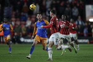 John Marquis of Shrewsbury Town and Connor Barrett of Walsall