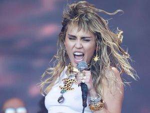 Supporting image for story: Miley Cyrus got ‘brutal infection’ after rolling around on Walk of Fame for film