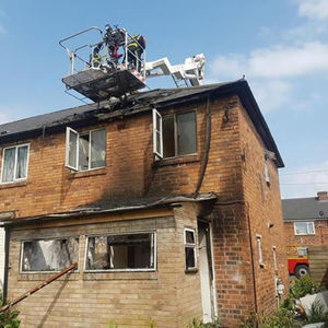 The team had been tackling a fire inside a house. Picture: Andrew Birch
