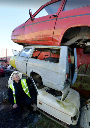 Chase Car Spares owner Darren Owen with Robins he uses for spares