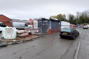 Tyler's car is still stuck in the road next to the construction site