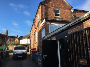 The top window of the flat above was smashed through