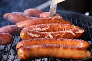 Sausages sizzling on a barbecue. From Pixabay