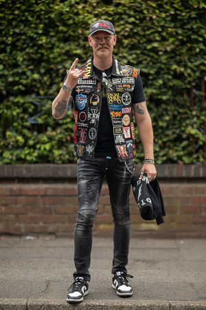 Music fan Hakan Svanberg, from Sweden, arrives to attend British rock band Black Sabbath's "Back to The Beginning" concert, Ozzy Osbourne's final ever gig as Black Sabbath's frontman at Villa Park in Birmingham, central England on July 5, 2025. Osbourne, who revealed in 2020 that he has Parkinson's disease, will join Tony Iommi, Geezer Butler and Bill Ward for the all-day "Back To The Beginning" show in Birmingham, central England, where the heavy metal giants formed in 1968. (Photo by Oli SCARFF / AFP) (Photo by OLI SCARFF/AFP via Getty Images)          