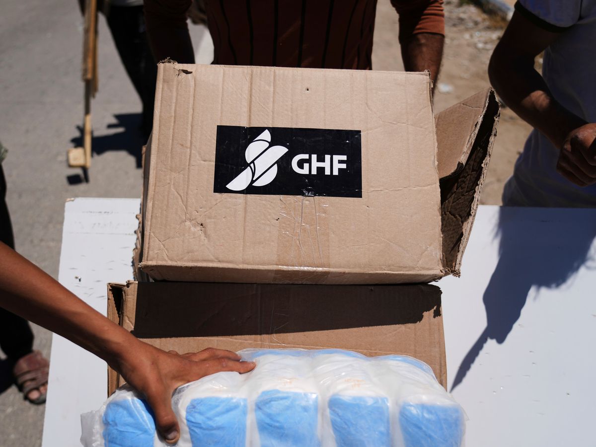 At least 20 Palestinians die in stampede at food distribution centre