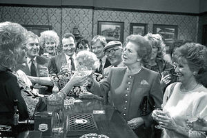 Toasting Julie Goodyear and the cast of Coronation Street during a visit to the soap set