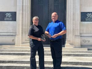 Supporting image for story: PC Charlie Jones received a Lifetime Achievement award and PCSO Gary Gwilt was awarded Rural PCSO of the year at the Wales Wildlife and Rural Crime Conference 2025 in Cardiff