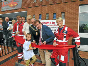 Supporting image for story: Star John Challis cuts ribbon at Midlands Air Ambulance HQ