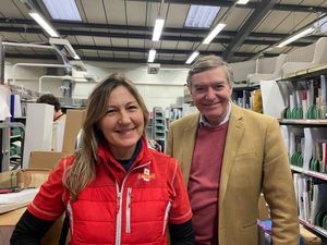 Supporting image for story: MP gives stamp of approval to local posties in sorting office visit