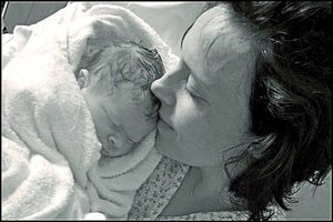 Rhiannon Davies of Ludlow Shropshire pictured with her daughter Kate just moments after her birth