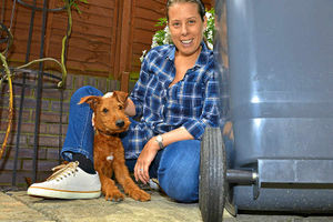 Supporting image for story: Puppy Charlie's wheelie lucky bin escape