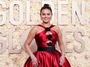 Supporting image for story: Selena Gomez reveals what she was whispering to Taylor Swift at Golden Globes