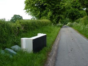 Supporting image for story: Council probe as sofa and rubbish dumped in quiet country lane