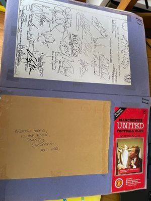 A copy of squad signatures from an overwhelmed Manchester United 
