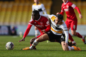 Dan Udoh of Shrewsbury Town and Thomas Sang of Port Vale (AMA)