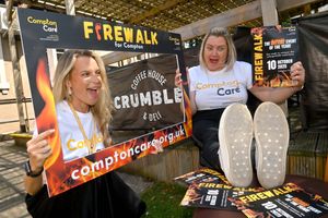 Staff members Cara Bright and Emily Thompson are getting ready for the Firewalk event