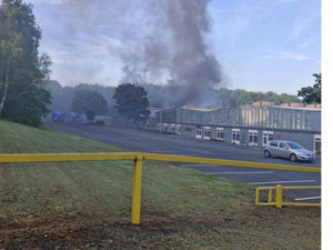 Plumes of smoke rising from the industrial estate