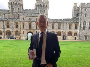 Supporting image for story: 'Blind Dave' collects long-awaited OBE at 'magical' ceremony 