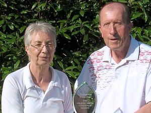 Supporting image for story: Liz Caird and Mike Hubbard take trophy