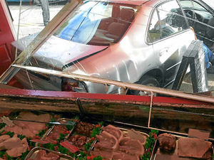 Supporting image for story: Driver reverses into butcher's shop