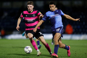 Tom Bloxham of Shrewsbury Town and Christian Forino Joseph of Wycombe Wanderers (AMA)
