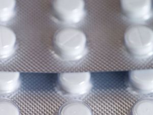 Small white tablets in blister pack