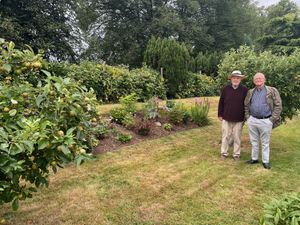 Councillor Roy Aldcroft (right) judged entries for Market Drayton In Bloom