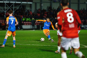 Tom Sang scores during the game between Salford City and Shrewsbury Town