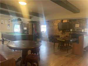 It has a pool table, flat screen TV and a 'fruity'. Photo: Rightmove