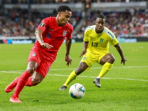 Walsall's Liam Gordon playing for Guyana against the United States in 2019. (Photo by Kerem Yucel / AFP)