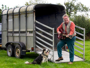 Supporting image for story: Farmer John trails his new song